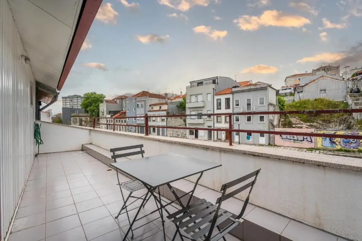 Private terrace at Invicta Porto Guest House overlooking Porto rooftops
